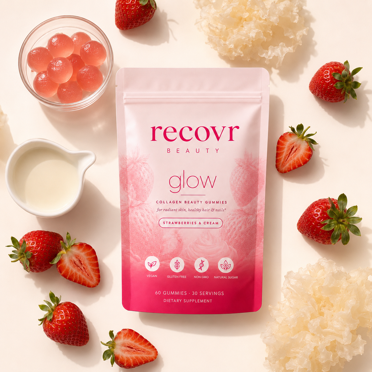 recovr glow pouch flat-lay with tremella, cream and strawberries